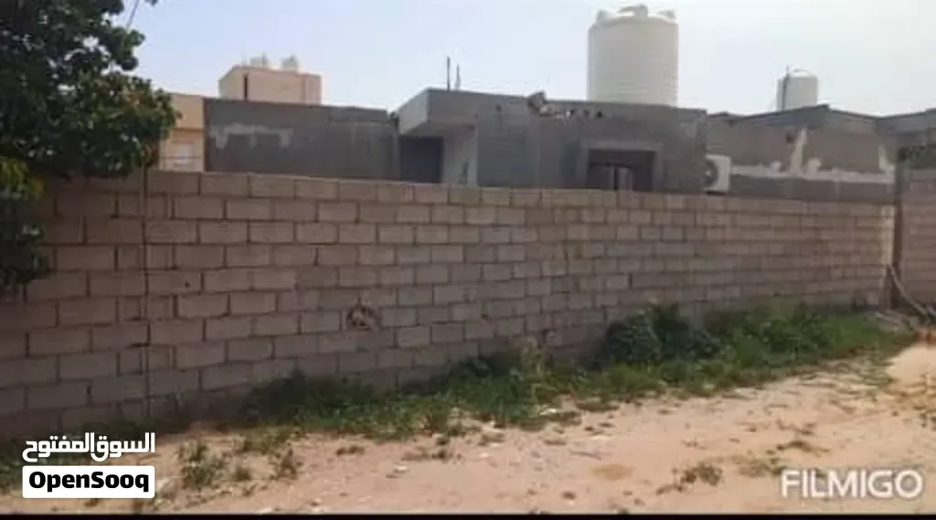 صورة 3 لـ قطعة أرض بها استراحة للبيع — طرابلس